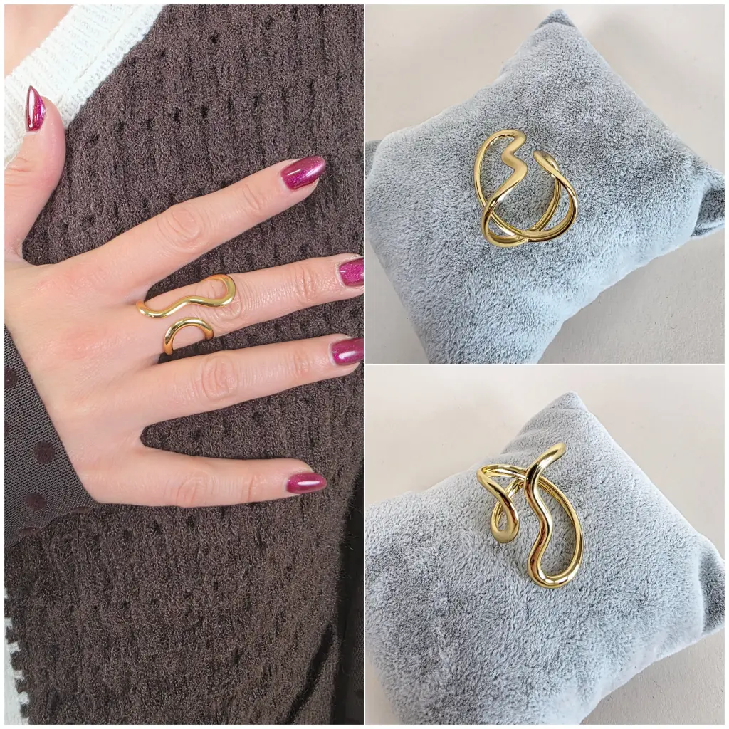 [00330] Bague dorée à la forme ondulée ouverte