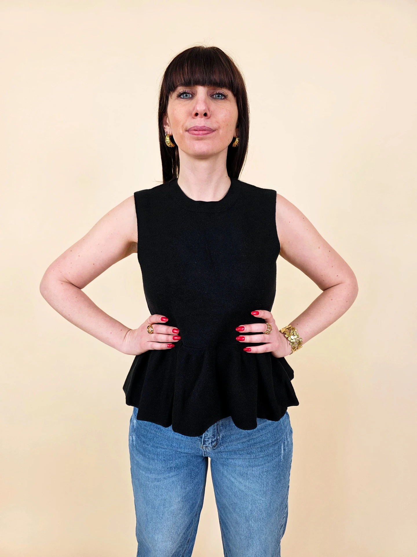 Blouse peplum noire sans Manches